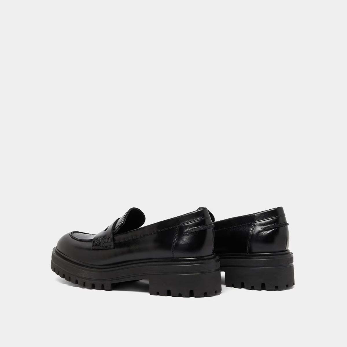 Mocassins à semelles crantées - en cuir noir