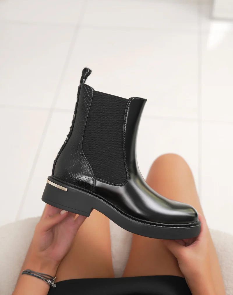 Bottines femme noires tendance style Chelsea avec paillettes arrière et semelle crantée