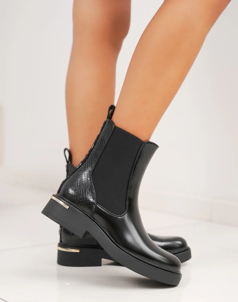 Bottines femme noires tendance style Chelsea avec paillettes arrière et semelle crantée