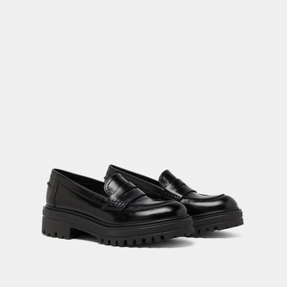 Mocassins à semelles crantées - en cuir noir