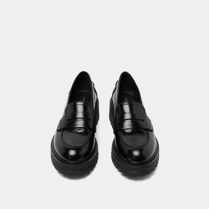 Mocassins à semelles crantées - en cuir noir