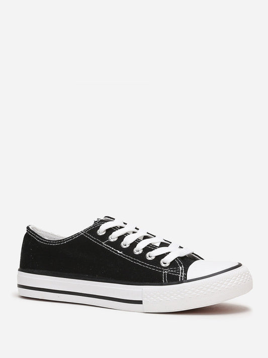 Tennis basses en toile - Noir / Blanc